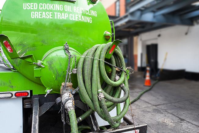 Grease Trap Cleaning of Parkland workers